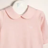 Body de algodon con cuello  redondeado con logo bordado Euge