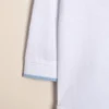 Body  polito de algodón con cuello y puñoos tejidos Lucas