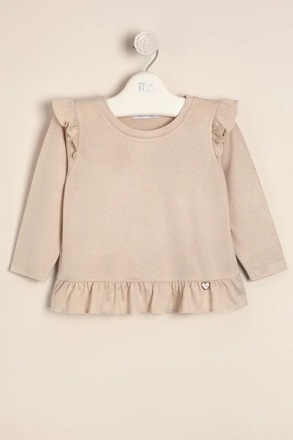 Remera con volado en ruedo y sisa