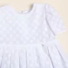 Vestido de broderie de algodón con dije de nacar Anto