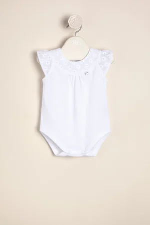 Body de algodón combinado con broderie de algodón en el canesú y dije de nacar Anto