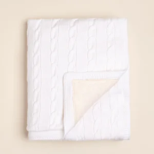 Manta con tejido de trenzas forrada con pielcita Soft